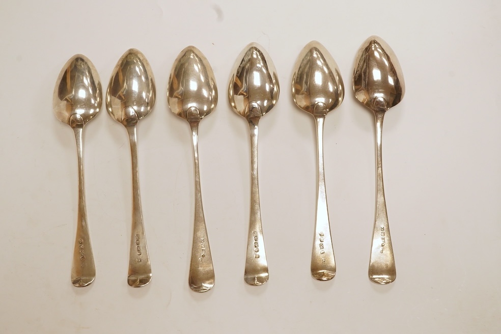 A set of six George III provincial silver table spoons by William Welch II, Exeter, 1807/8 & 1810, with engraved initials, 23cm, 12oz. Condition - fair to good